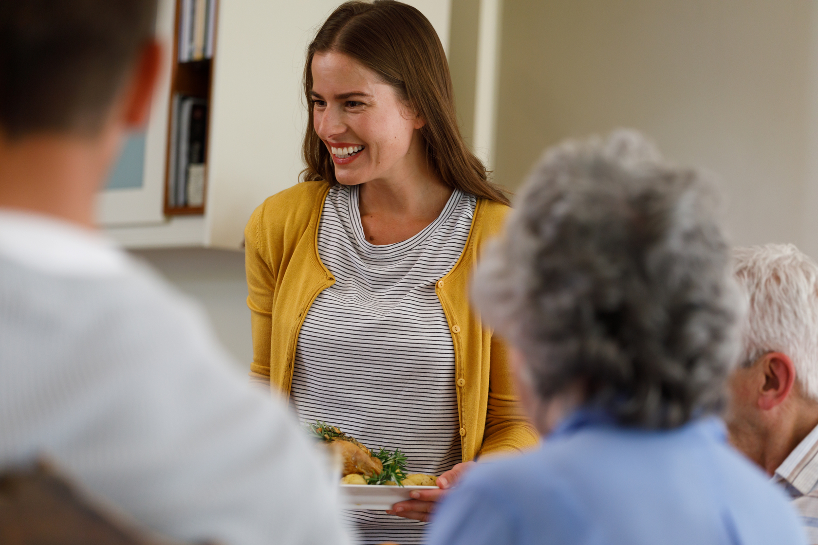 Nurse and seniors in memory care community.